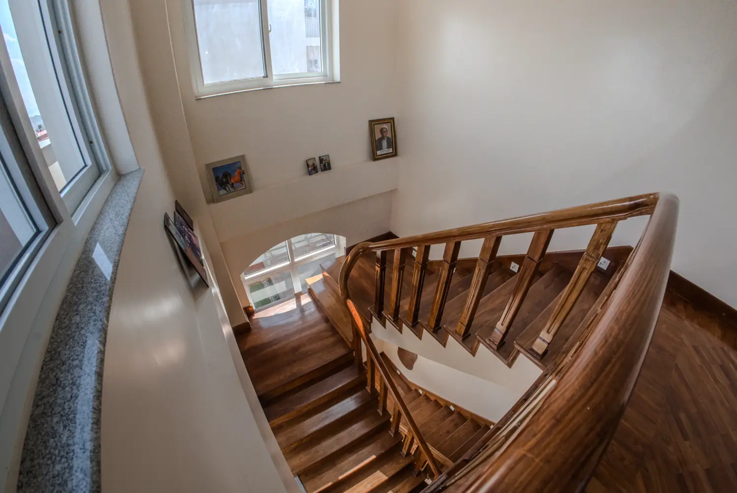 Wooden stair with family photographs